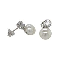 silver push back earrings decorated with freshwater pearls and cz