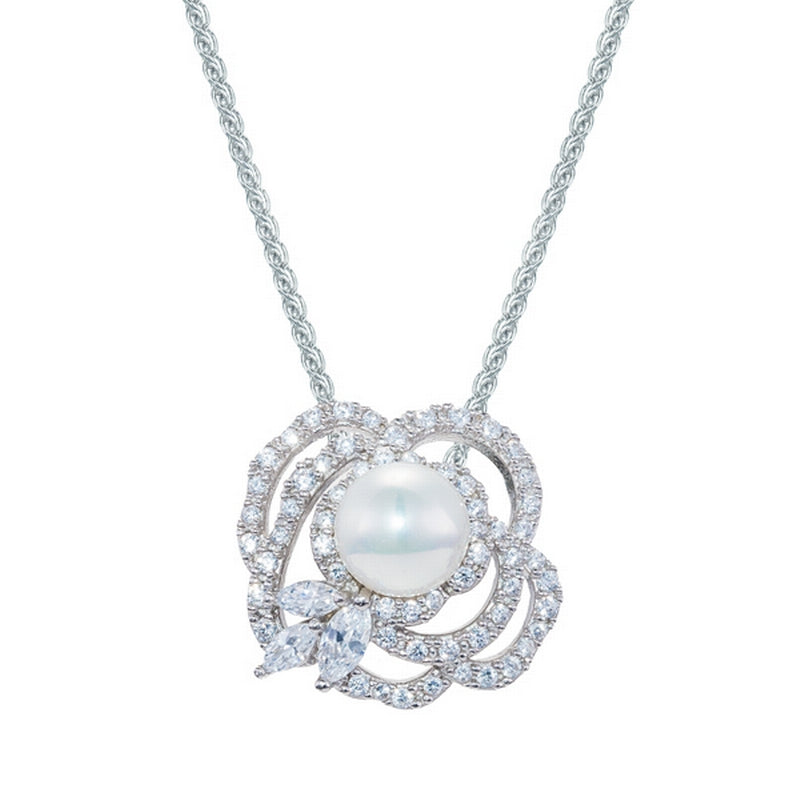 pendant  stoneset outline of a flower with a pearl in the centre