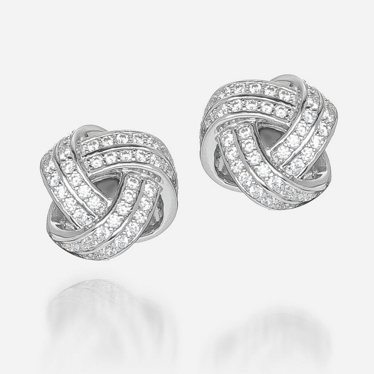 petite knotted bundle of zirconia gemstones in fine sterling silver
