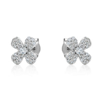 fully stone set floral stud earrings with claw set cubic zirconia center stone in sterling silver
