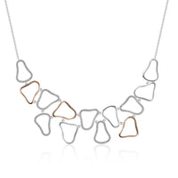 sterling silver open cluster necklace with rose gold accents