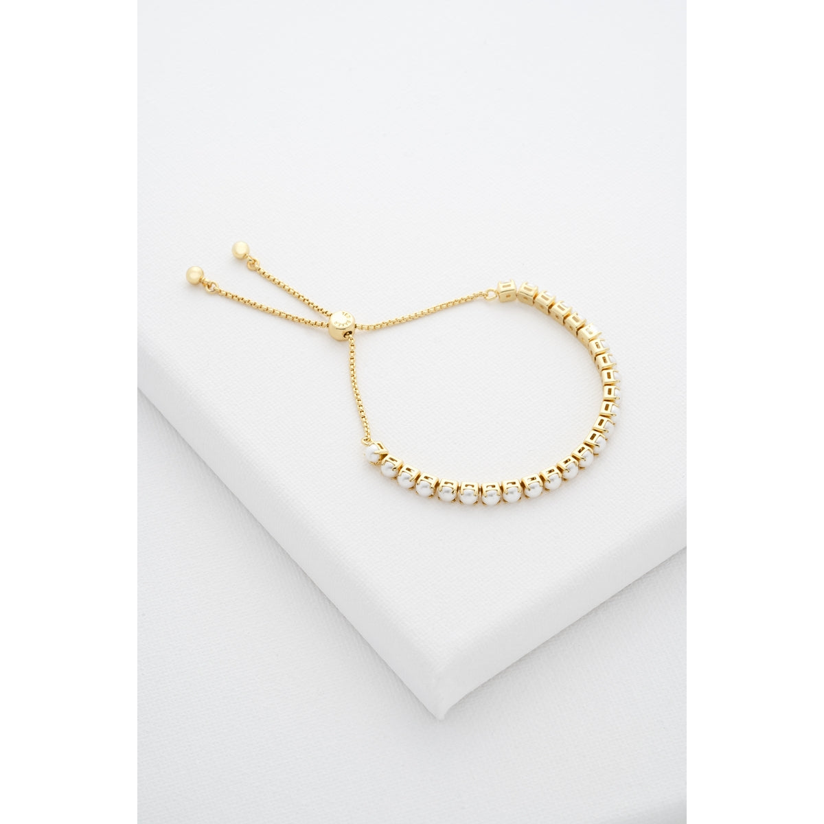 ted baker pearl tennis gold tone sliding braceelt