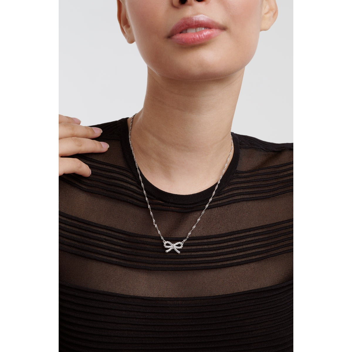 ted baker ribah: crystal silver tone ribbon bow pendant