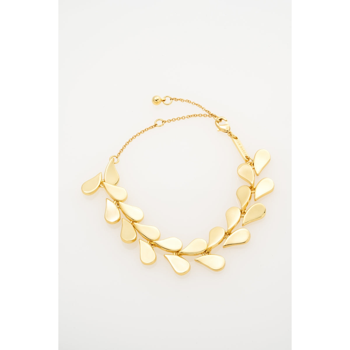 ted baker anya: abstract heart adjustable bracelet gold tone