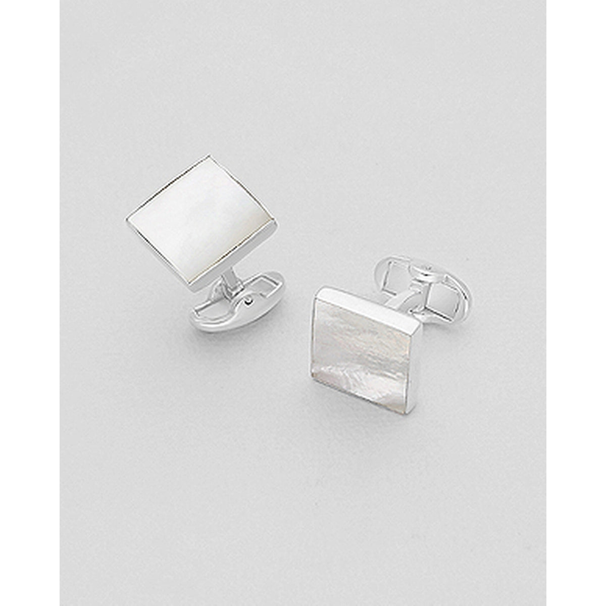silver cuff links featuring square decorated with shell