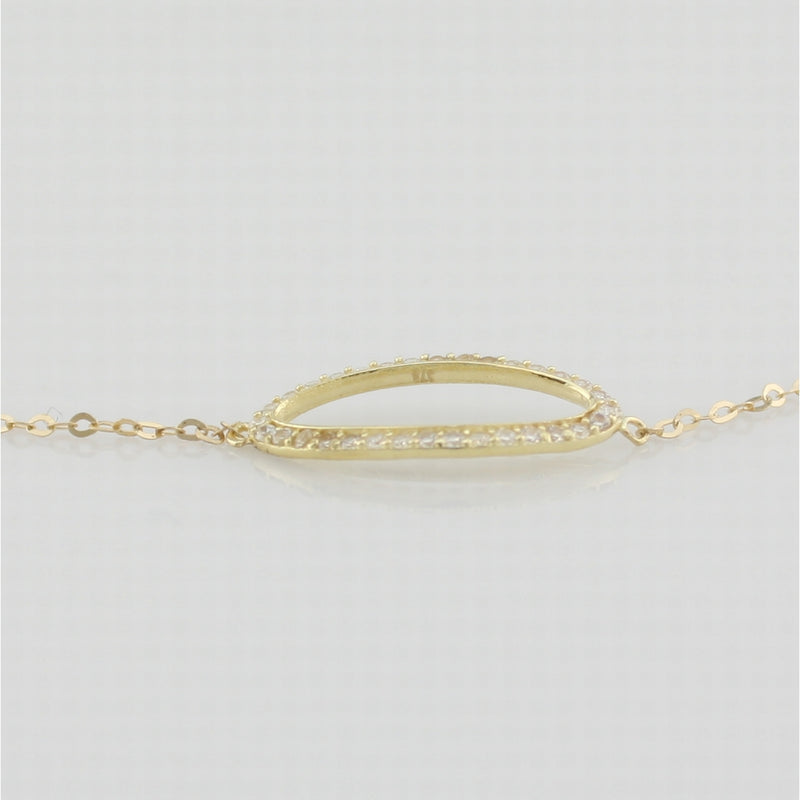 9k yellow gold bracelet with open oblong in white cz