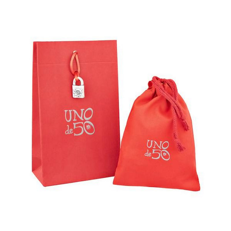 uno de 50 symbiosis needle and button earrings in gold plated metal alloy with white topazes